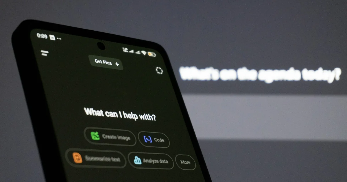 Smartphone showing an AI assistant app asking what it can help with